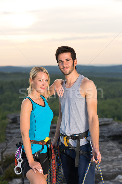 Rock climbing active couple on top sunset Stock photo © CandyboxPhoto