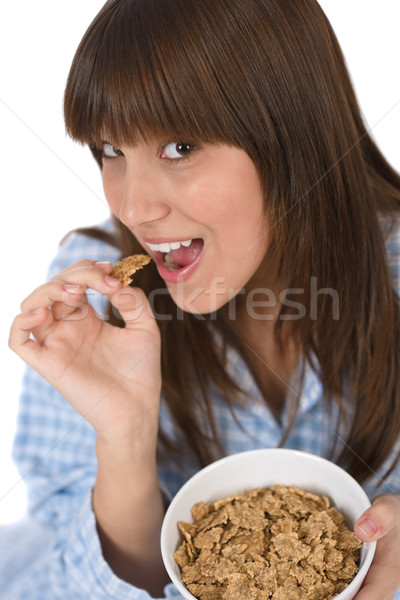 Weiblichen Teenager essen gesunden Getreide Frühstück Stock foto © CandyboxPhoto