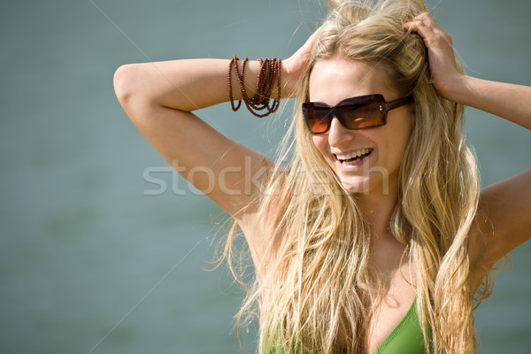 Happy blond woman enjoy holiday at lakeside Stock photo © CandyboxPhoto