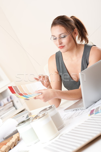 Young female designer working at office with laptop Stock photo © CandyboxPhoto