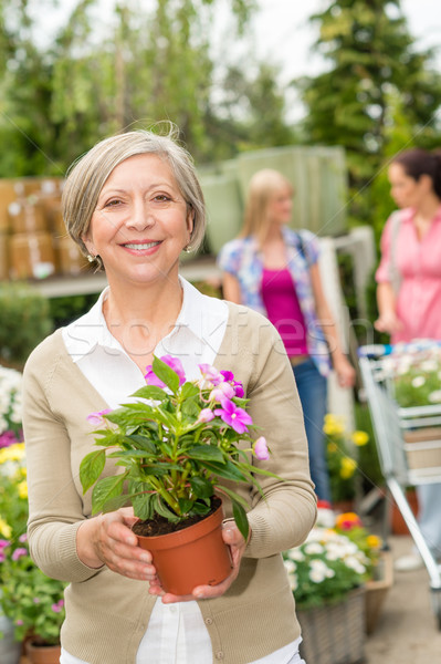 Altos mujer mantener jardín de flores tienda dama Foto stock © CandyboxPhoto