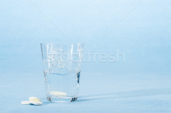 Fizzy vitamin capsule throw in water glass Stock photo © CandyboxPhoto