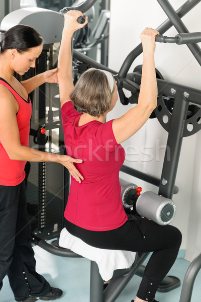 Fitness center trainer senior woman exercise back Stock photo © CandyboxPhoto