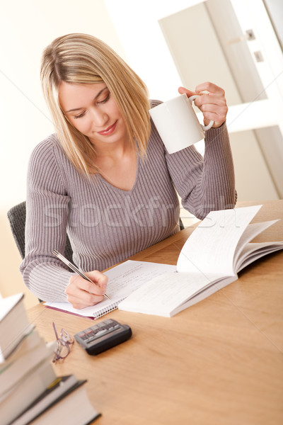 Student blond meisje schrijven huiswerk vrouw Stockfoto © CandyboxPhoto