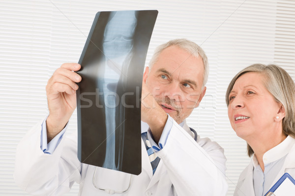 Medical team senior doctors look at x-ray Stock photo © CandyboxPhoto