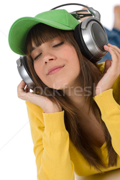 Happy female teenager enjoy music with headphones  Stock photo © CandyboxPhoto