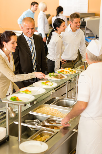 Business colleagues cook serve lunch canteen food Stock photo © CandyboxPhoto