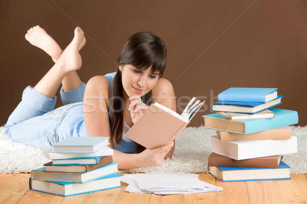 836123_stock-photo-home-study---woman-teenager-read-book.jpg