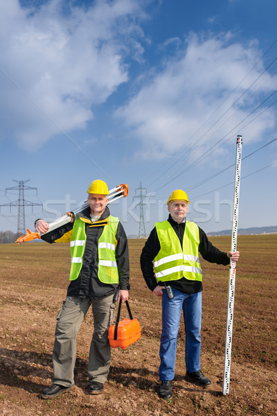 Geodesist two man equipment on construction site Stock photo © CandyboxPhoto