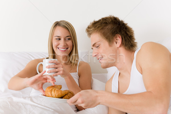 Luxury hotel honeymoon breakfast - couple in bed Stock photo © CandyboxPhoto