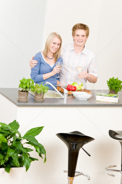 Stock photo: Lunch happy couple cook salad enjoy wine