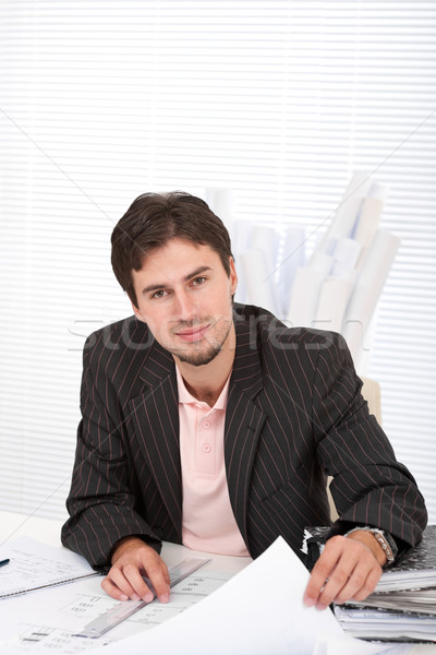 Stock photo: Young architect working at office