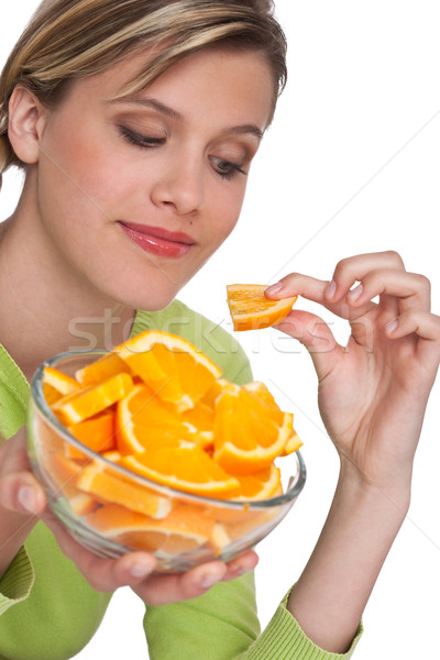 Zdjęcia stock: Kobieta · pomarańczowy · biały · żywności · młodych