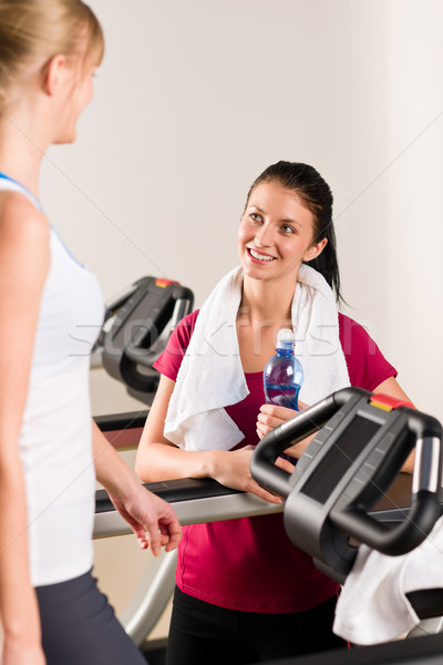 Young female friends chatting in fitness center Stock photo © CandyboxPhoto