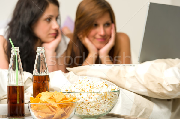 Young girls having slumber party, watching movies Stock photo © CandyboxPhoto