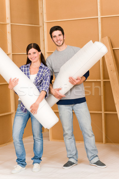 Stock photo: Home improvement young couple work on renovations