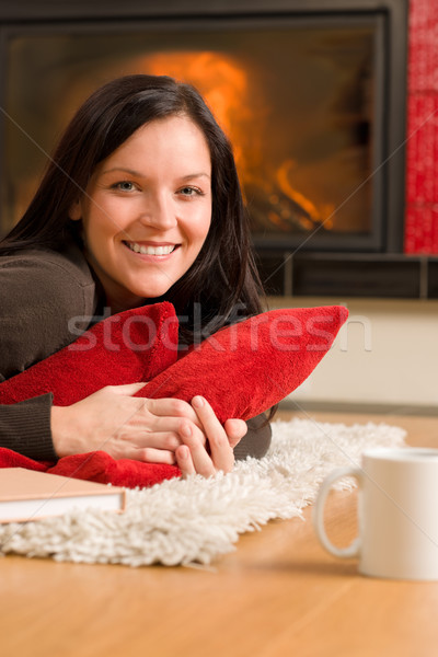 Home living happy woman lying by fireplace Stock photo © CandyboxPhoto