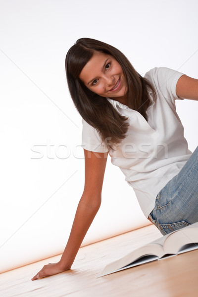 Happy teenager sitting with book Stock photo © CandyboxPhoto