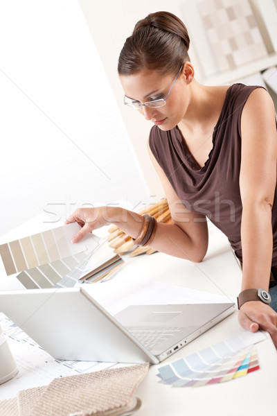 Smiling female designer with color swatch  Stock photo © CandyboxPhoto