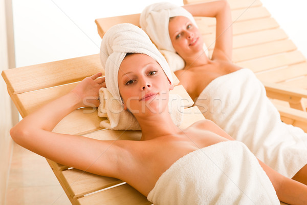 Beauty spa room two women relax sun-beds Stock photo © CandyboxPhoto