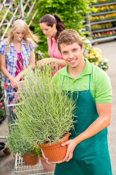 Garden centre worker hold potted plant Stock photo © CandyboxPhoto