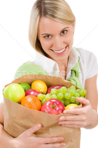 Healthy lifestyle - woman with fruit shopping paper bag Stock photo © CandyboxPhoto