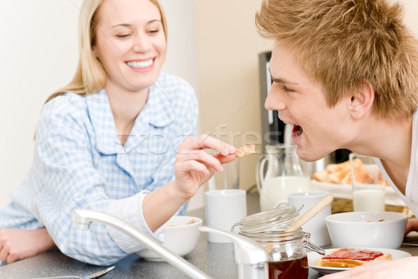 Breakfast happy couple woman feed man cereal Stock photo © CandyboxPhoto