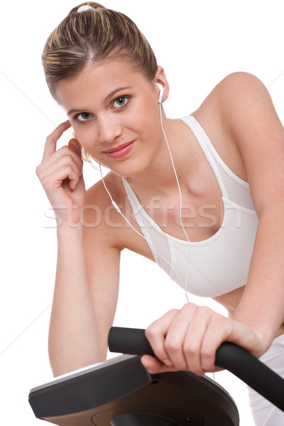 Foto stock: Fitness · mulher · fones · de · ouvido · ciclismo · branco · menina