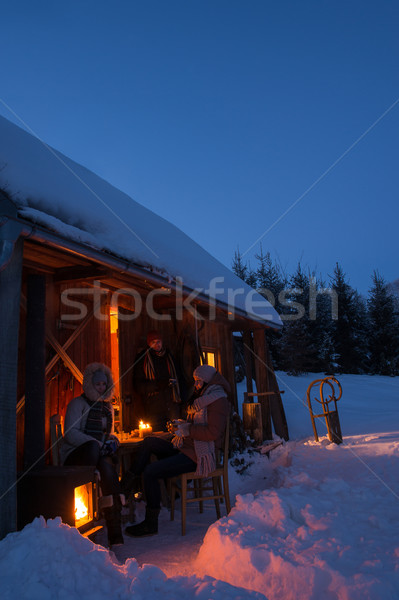 Sunset winter cottage friends enjoying evening Stock photo © CandyboxPhoto