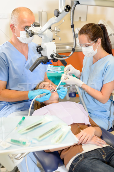 Vrouw tandarts chirurgie behandeling tandheelkundige kantoor Stockfoto © CandyboxPhoto