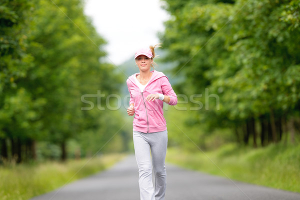 Jogging fiatal nő fut park út fiatal Stock fotó © CandyboxPhoto