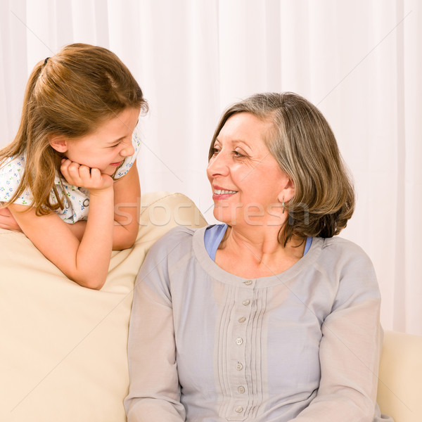 Nonna pronipote guardare altro relax divano Foto d'archivio © CandyboxPhoto