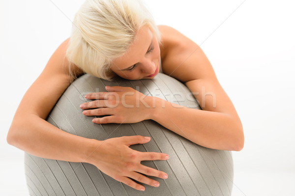 Tired sportive woman resting on fitness ball Stock photo © CandyboxPhoto