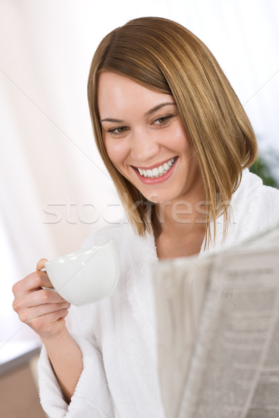 Сток-фото: завтрак · счастливым · женщину · чтение · газета · пить