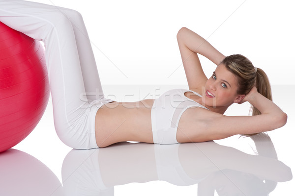 Fitness - Young woman with exercise ball on white Stock photo © CandyboxPhoto