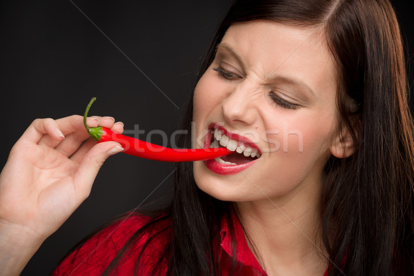 Portret młoda kobieta czerwony pikantny gryźć Zdjęcia stock © CandyboxPhoto