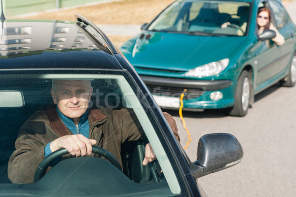 Man helping woman by pulling her car Stock photo © CandyboxPhoto