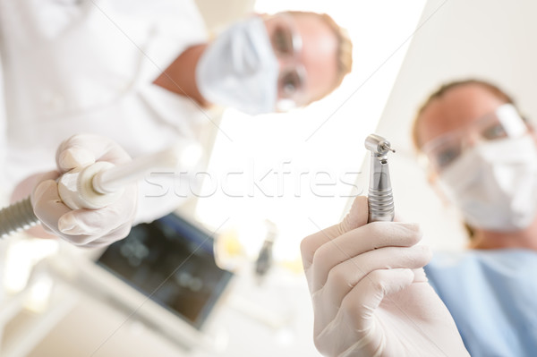 Homme dentiste assistant accent forage patient [[stock_photo]] © CandyboxPhoto