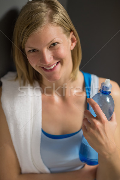 Frau halten Wasserflasche Umkleideraum glücklich Fitnessstudio Stock foto © CandyboxPhoto