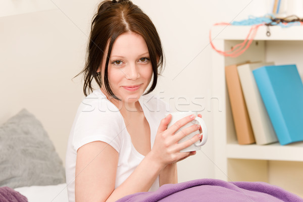 Young student girl drink coffee in bed Stock photo © CandyboxPhoto