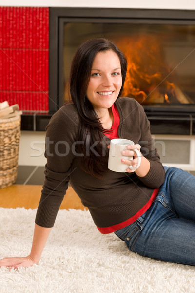 Inverno casa lareira mulher beber quente Foto stock © CandyboxPhoto