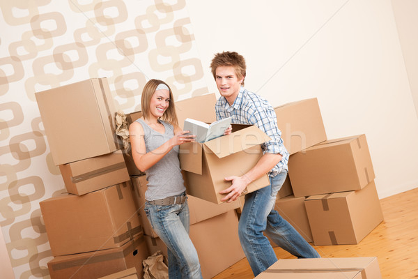 Moving house: Young couple with box  Stock photo © CandyboxPhoto