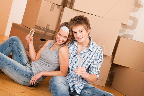 Moving house: Happy man and woman celebrating Stock photo © CandyboxPhoto