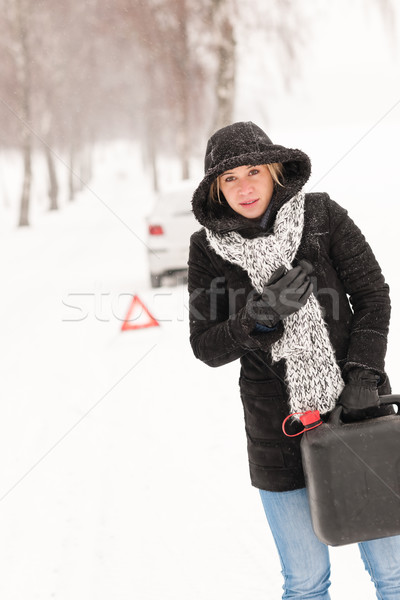 Woman holding gas can winter car breakdown Stock photo © CandyboxPhoto