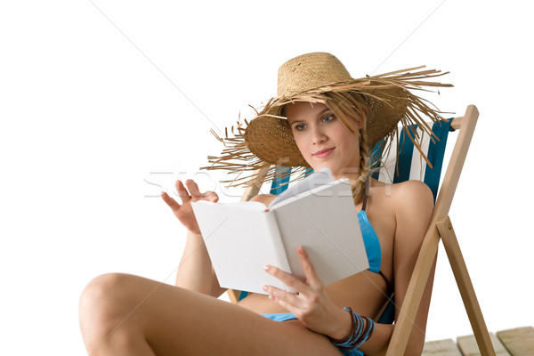 Stock photo: Beach - Young woman relax with book in bikini