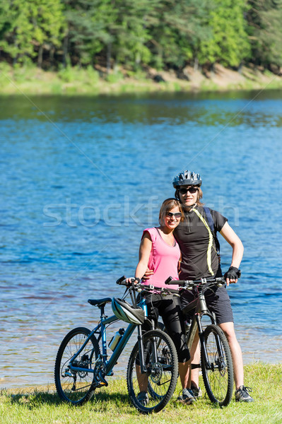 Teenager bikers hugging at lakeside Stock photo © CandyboxPhoto