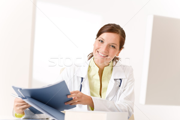 Female doctor at medical office with stethoscope Stock photo © CandyboxPhoto