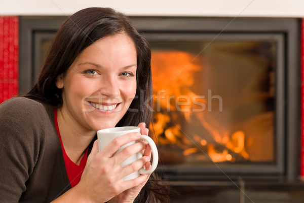 Imagine de stoc: Iarnă · acasă · cămin · femeie · bea · fierbinte
