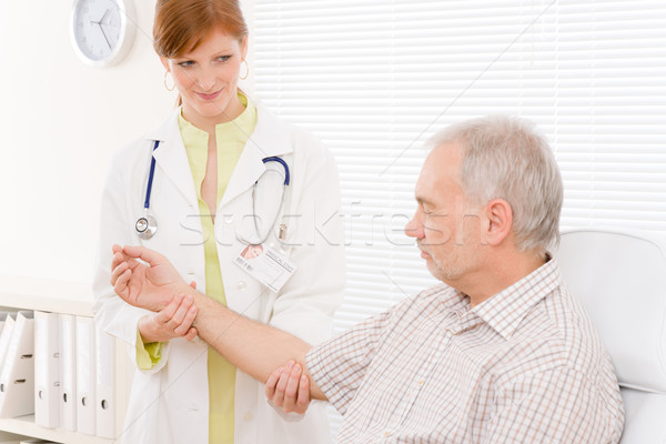Doctor office - female physician examine patient Stock photo © CandyboxPhoto