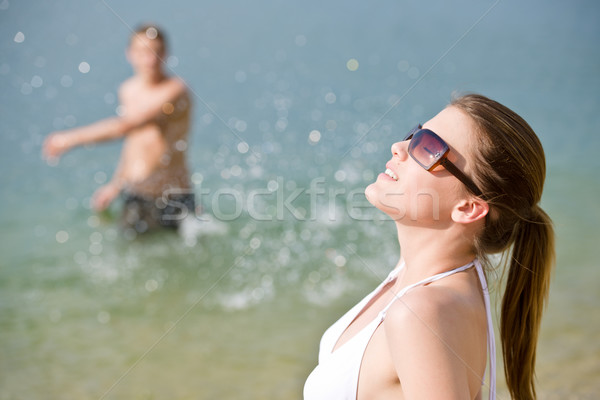Pareja playa mujer bikini tomar el sol mar Foto stock © CandyboxPhoto